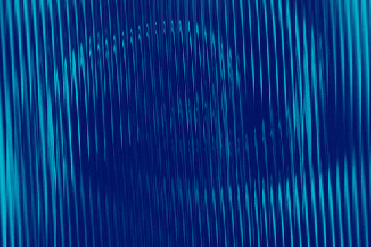 Blue Abstract Background with Vertical Wavy Lines and Motion Blur Effect