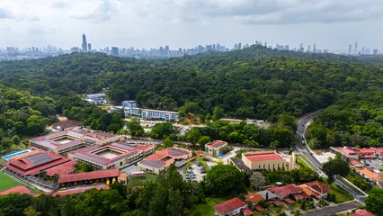 Panama 05 13 2026,Drone view of Clayton, Panama City, with dense tropical forest and the skyline of Panama City in the distance. © cris
