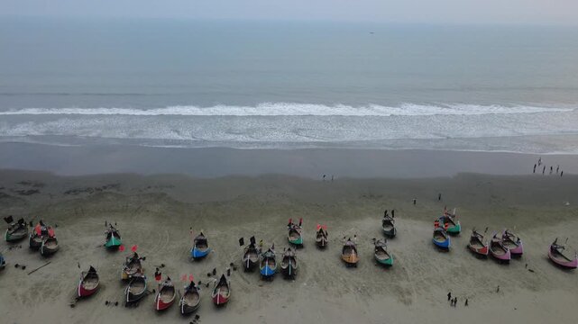 Traditional Wooden Fishermen's fishing boat, Teknaf Coxs bazar, Bangladesh. Colorful Wooden Fishing Boat On a Cox's Bazar Sea Beach With Blue Background in Bangladesh 