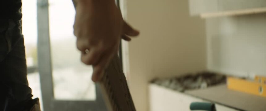 Cinematic footage capturing modern construction, craftsmanship, home renovation, and building development through detailed shots of workers, tools, materials, and active job sites. Ideal for themes of