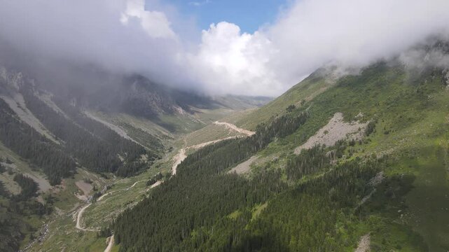 Footage of the divided road that passes through the mountains, through the valley and provides intercity transportation