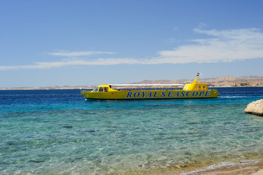 Sharm El Sheikh, Egypt - March 12, 2025: bathyscaphe pleasure boat with tourists on an excursion in the Red Sea.