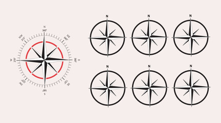 Obraz premium Set of black compass rose navigation symbols on light beige background victor illustration