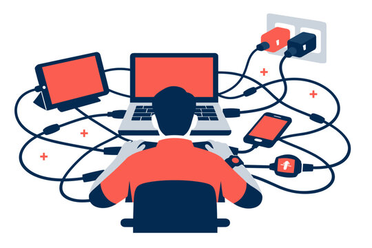 A person at a desk with multiple devices (laptop, tablet, smartwatch)