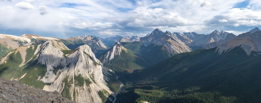 Mountain landscape with river valley and peaks, rainbow, peaks with orange sulphur deposits, Overturn Mountain, panoramic view, Nikassin Range, near Miette Hotsprings, Sulphur Skyline, Jasper National Park, Alberta, Canada