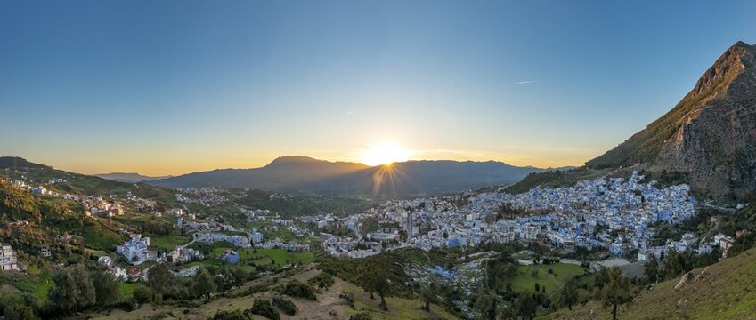 View on Chefchaouen with last sunbeams at sunset, Chaouen, panorama, reef mountains, Tangier-T&eacute;touan, Morocco