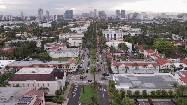 Aerial view of Royal Palm Way leading toward Palm Beach skyline