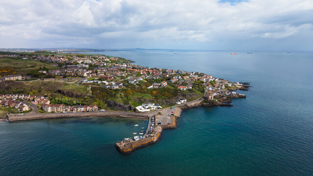 Pettycur harbour pier and coastal village. Scenic Firth of Forth, Fife.
