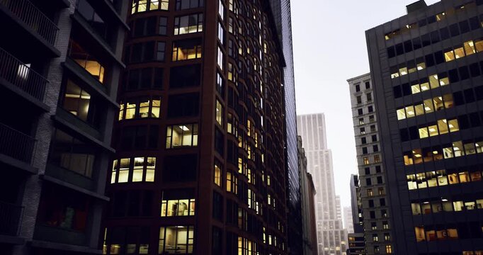 City buildings view, Sunset illuminates modern brick and glass structures, Evening glow highlights intricate features of urban architectural facades