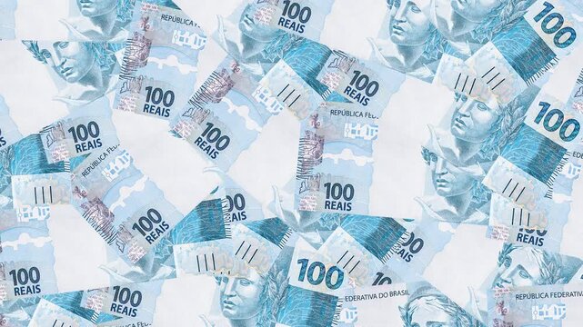 Background texture of Brazilian money bills, 100 reais notes, background for video or scenery.