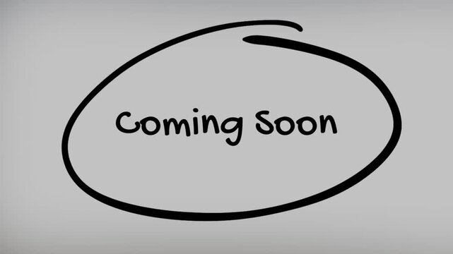 Coming Soon Hand Writing Text on Glass Screen