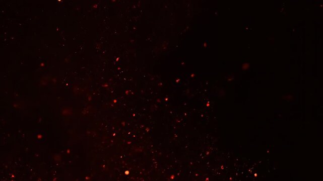 Dark abstract background with glowing red particles