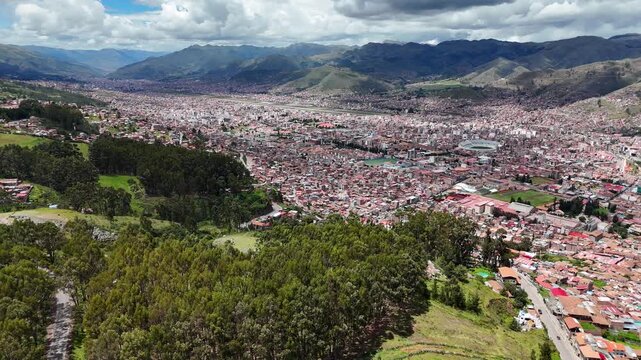 Aerial view of the Qenqo forest and the city of Cusco, Peru