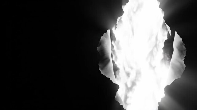 Tearing black paper revealing bright light in sequence. Rip expands across frames showing glowing breakthrough. Abstract visual effect for innovation and transformation concepts in corporate media