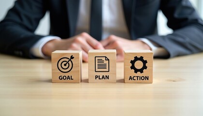 Naklejka premium Businessman arranges wooden cubes showing goal plan action sequence. He points to cube, signifying progress on business development project. Success is achieved through strategic stpic.
