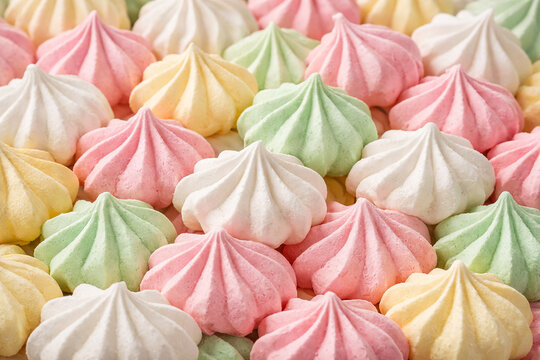 Colorful wrapped candies in close-up arrangement on white background