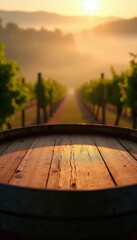 Obraz premium Wooden barrel top sits before sunlit vineyard rows. Misty hills and morning sun create warm amber light. Perfect for wine ads or agri-tourism promotion.