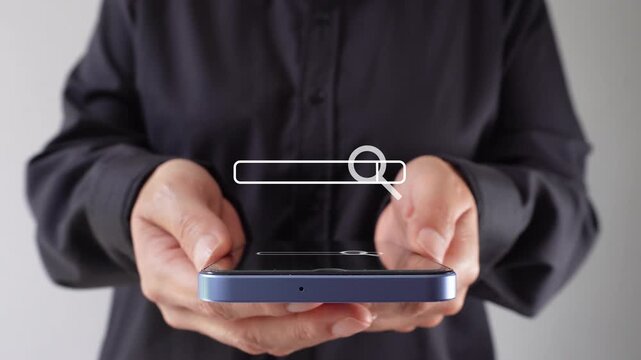 Businesswoman holding her mobile phone with an animation of a web search bar with: job search