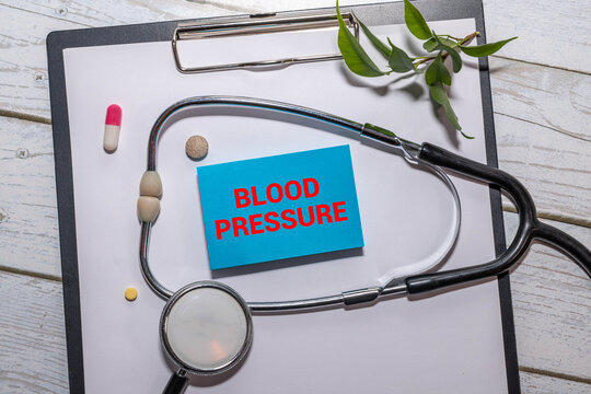 Doctor checking patient arterial blood pressure. Health care measuring blood pressure of patient