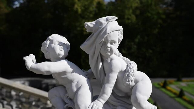 Sculptures in park of Wilanow Palace. Wilanowski Palace is a royal palace located in the Wilanow district, Warsaw, Poland. Wilanow Palace survived Polands partitions and both World Wars.