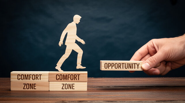 Man stepping out of comfort zone to opportunity on wooden blocks