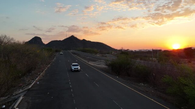Aerial view of highway in Honduras at sunset, infrastructure to improve regional connectivity