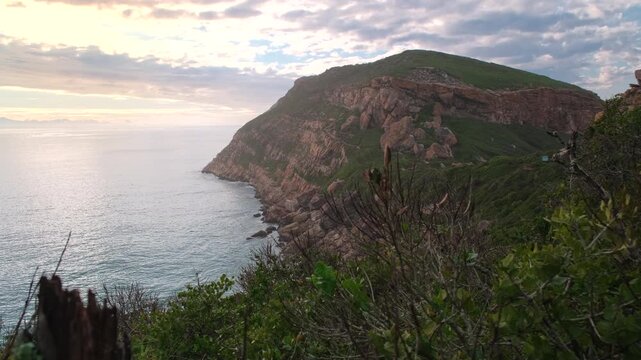 Headland of Robberg nature reserve and hiking trail at sunrise, Plettenberg Bay