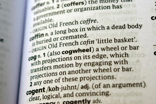 Close Up English Dictionary Page With The Word Translation Of -  cogent