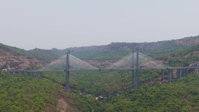 Western Ghats Expressway Aerial View,
Modern Expressway Bridge Maharashtra India,
Aerial Drone Shot of Lonavala Expressway Missing Link



