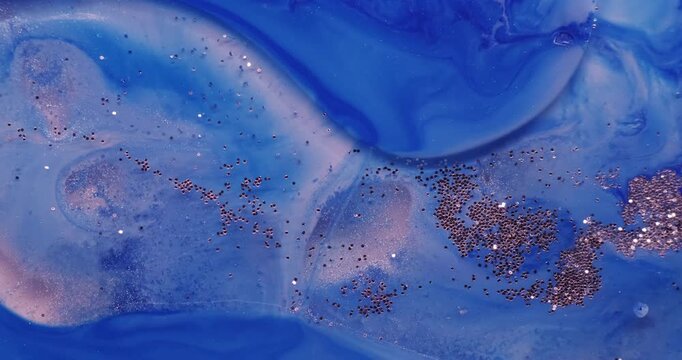 Blue paint water. Sequins background. Blur color pigment in acrylic marble glitter fluid round texture flowing on creative art abstraction.