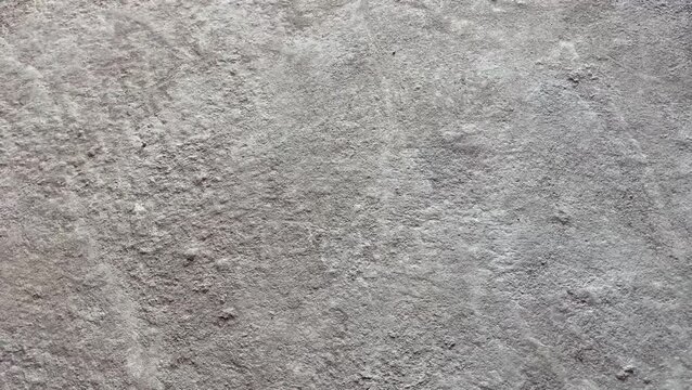 Gray concrete wall texture with rough surface abstract background
