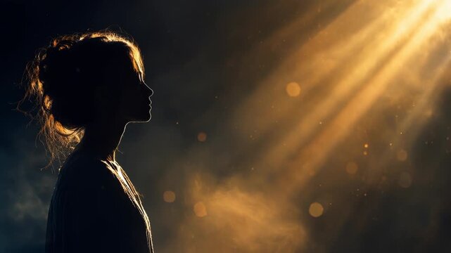 Illuminated Female Silhouette in Golden Light Rays Spiritual Journey of Hope and Inspiration Through Radiant Atmosphere