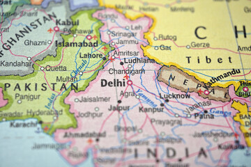 Naklejka premium Selhi Highlighted on Blurred World Map – Industrial North India Ganges Belt City Concept