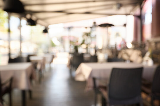 Blurred restaurant interior invites quiet exploration background