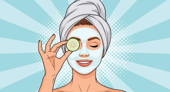 Young woman with a towel on her head wearing a white facial mask and holding a cucumber slice over her eye for skin care.