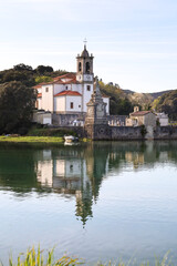 Obraz premium The Cemetery of Niembro and Our Lady of Sorrows church in Barro, Asturias
