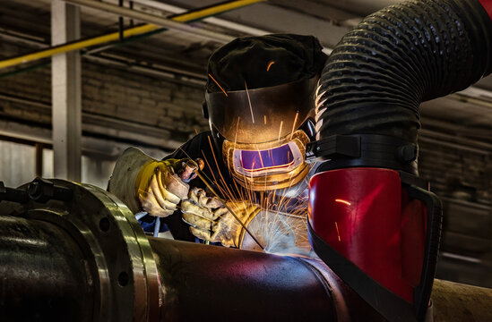 Welding pipe joint in shop