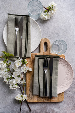 Table setting for spring hliday dinner with cherry blossom
