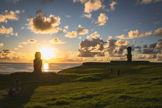 Stunning sunset over the Moai statues on Easter Island