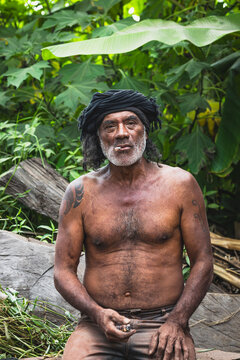 Rugged senior man with a turban in the jungle