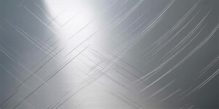 A sleek brushed stainless steel metal texture features a subtle grey metallic surface with light reflective linear patterns for a modern industrial design backdrop