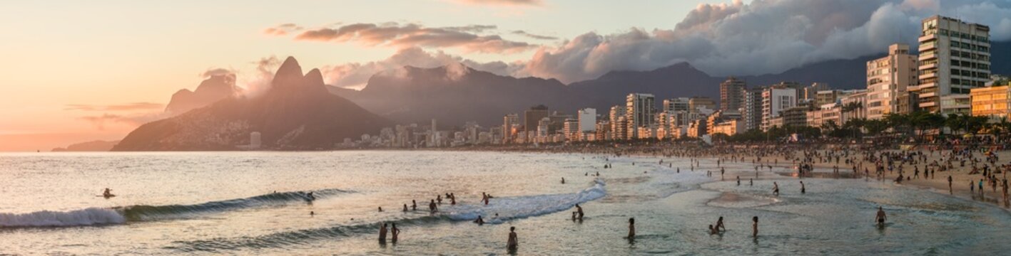 Ipanema beach with Morro Dois Irmaos mountain at sunset, Rio de Janeiro, Brazil