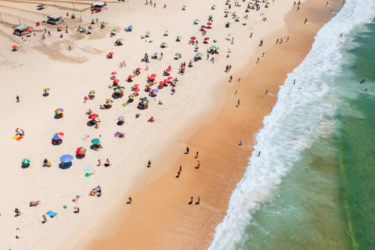 Aerial view of Copacabana beach with people, Rio de Janeiro, Brazil