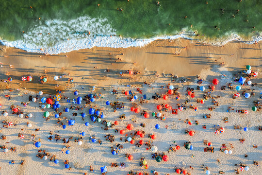 Aerial view of Copacabana beach crowded with people at sunset, Rio de Janeiro, Brazil