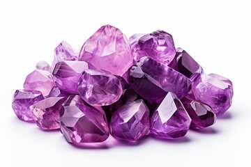 Fototapeta premium Amethyst crystals forming a beautiful purple heap on a white background