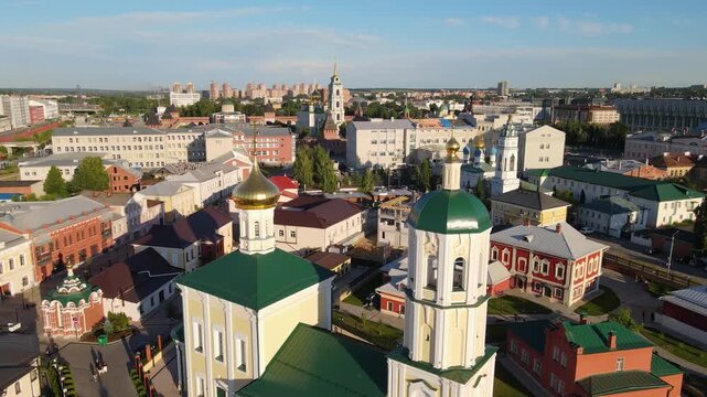 Aerial view of the historical center of Tula, Russia. Drone panorama featuring the Church of the Annunciation and the Tula Kremlin in the distance under a clear blue sky