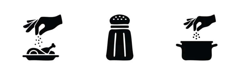 Black and white icon set featuring hands sprinkling salt onto food and into a pot, alongside a classic salt shaker. © Lili