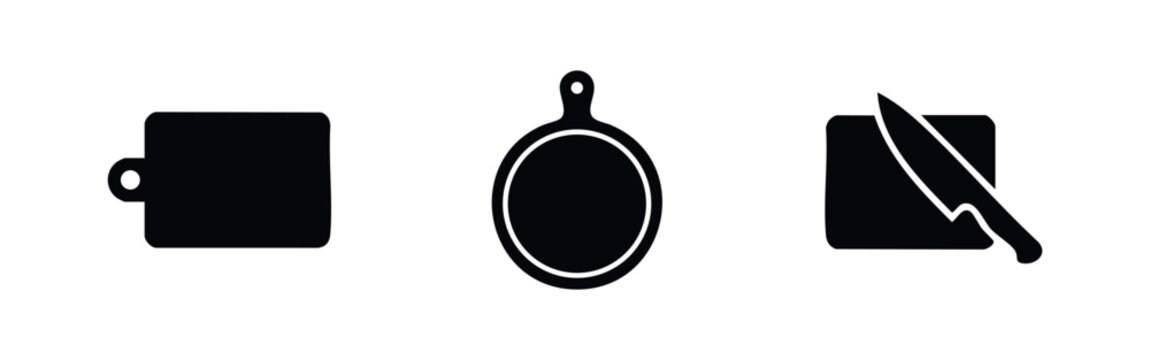 Set of three minimalist black cutting board and knife icons for kitchen themes. Includes rectangular and circular boards, plus a knife silhouette.