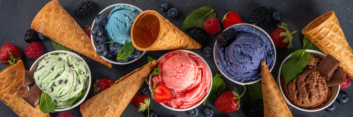 Fototapeta premium Colorful bright ice cream on bowls, with waffle cones