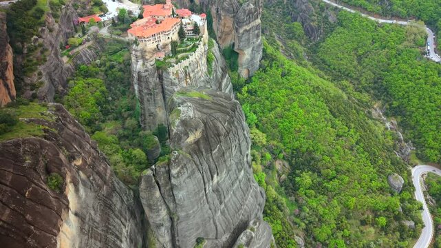 High-Altitude Aerial Video of Varlaam and Rousanou Monasteries in Meteora, Greece. 